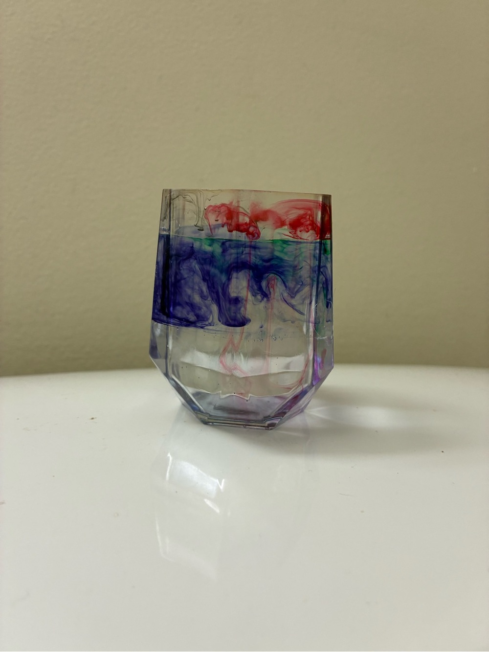 Geometric Decorative resin pen holder cup with Red, Blue, and Green Swirl Design
